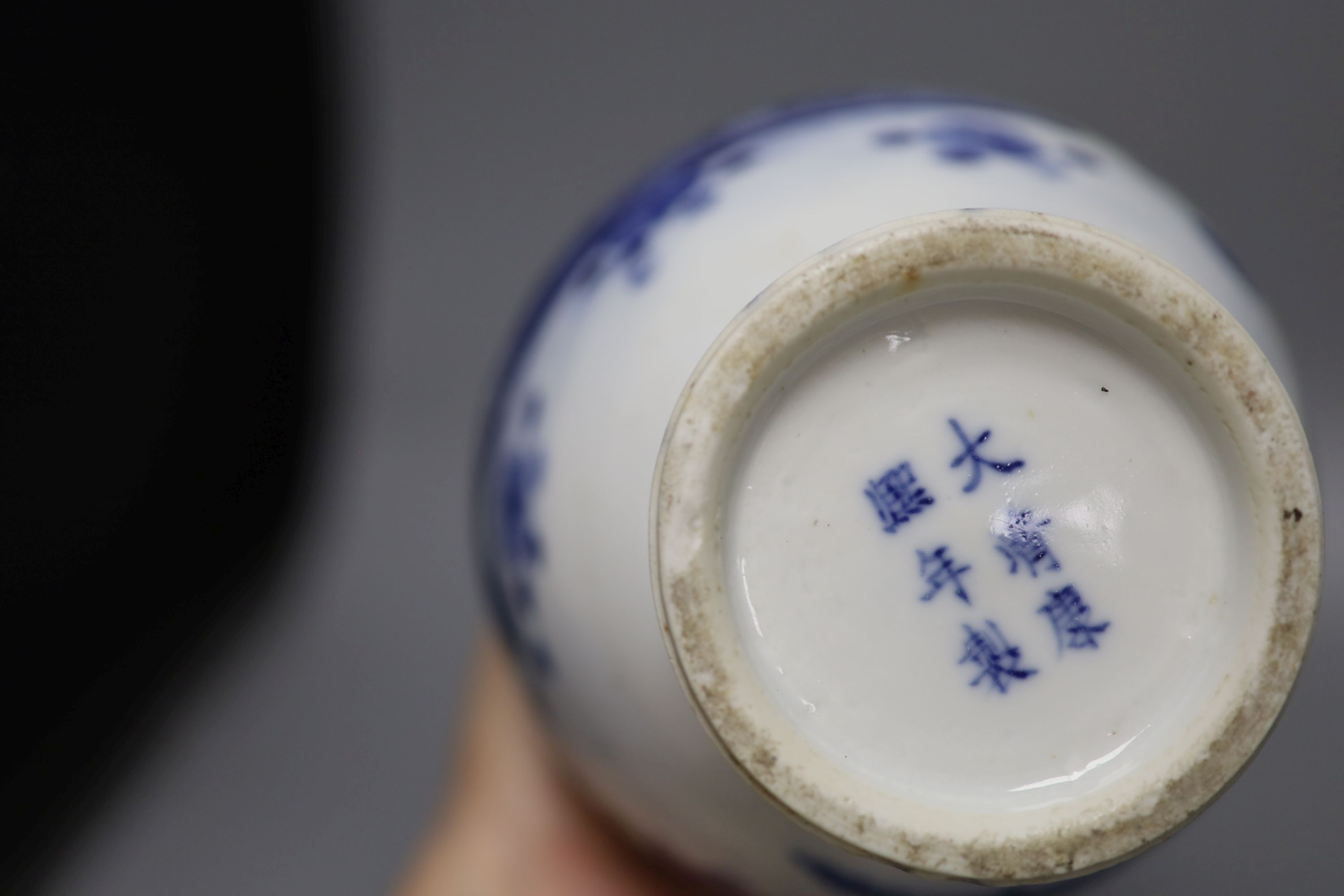 A pair of 19th century Chinese blue and white vases (a.f.), 23cm high